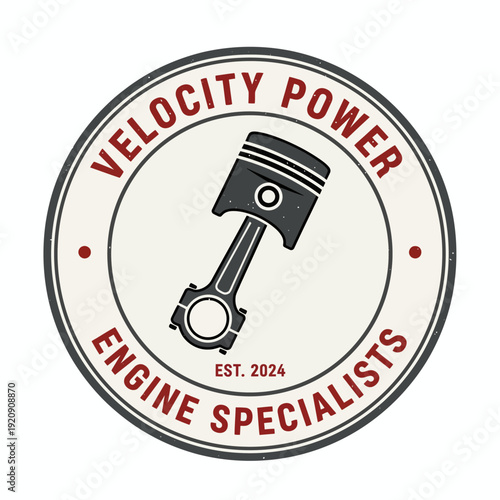 A circular emblem showcasing a piston, encased in rings of text that reads "Velocity Power" and "Engine Specialists.