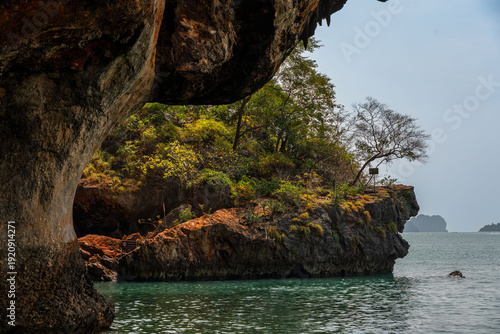 Tableau sur toile Limestone cave overhang and rocky coastline at Phra Nang Beach in Railay Krabi