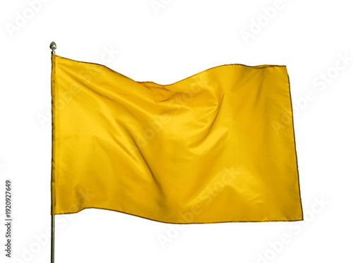 Bright yellow flag waving against white background