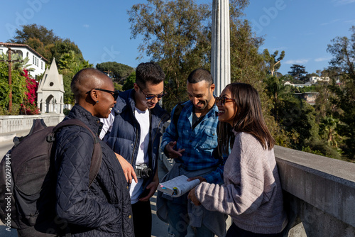 Friends Exploring Outdoors While on a Bridge