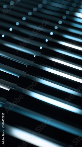 Close up of piano keys with elegant lighting in blue tones
