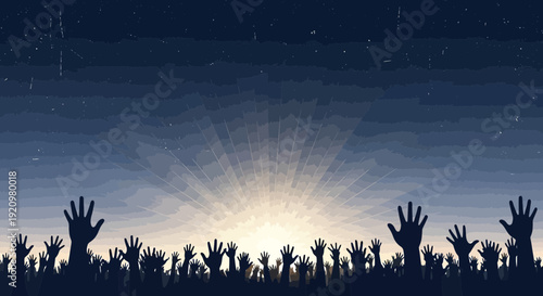 Crowd of people with hands raised in celebration at sunset