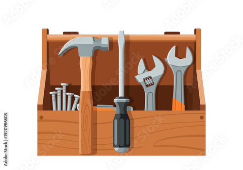 Toolbox containing various tools like hammer, screwdriver, and wrench on a wooden workbench