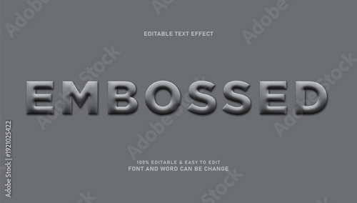 Fotografie Embossed Text Effect on Gray Sand Texture Background