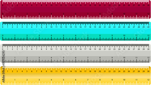 Colorful rulers in red, green, gray, and yellow