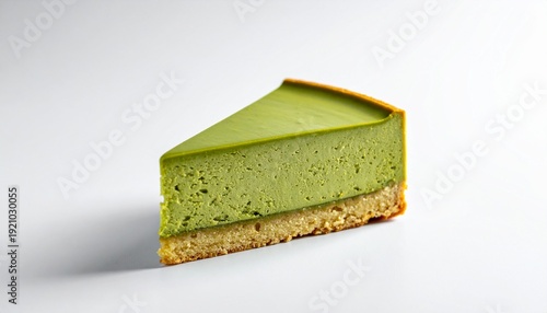 Slice of Green Tea Cheesecake on White Background.