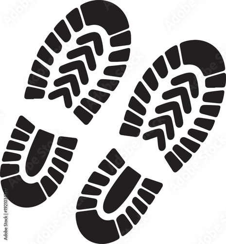 A black and white silhouette of some boot prints