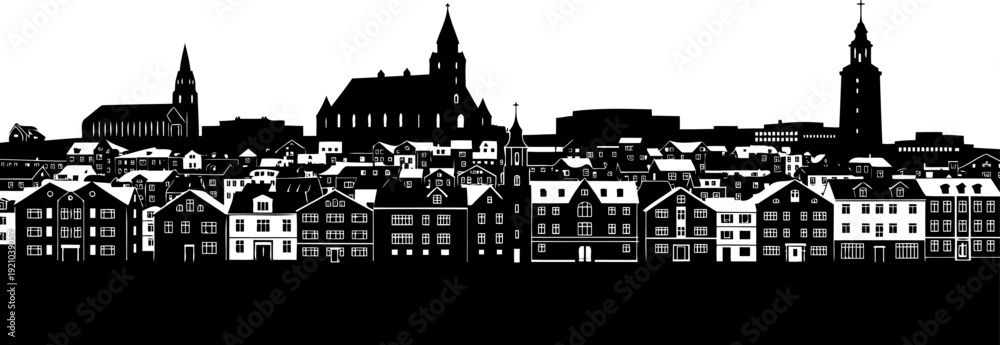 Obraz premium European coastal town skyline with historic buildings