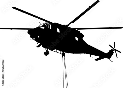 Heavy lift transport helicopter silhouette flying in the air