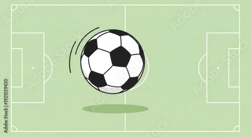 Soccer ball in motion on green football field with white markings and goal areas