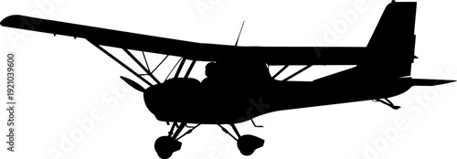 Light aircraft bush plane in flight silhouette
