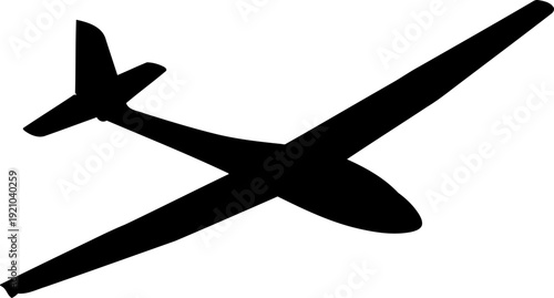 Sailplane glider silhouette flying in the open sky