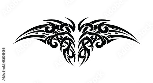 Intricate black tribal tattoo design featuring a symmetrical ornamental motif and bold silhouette.