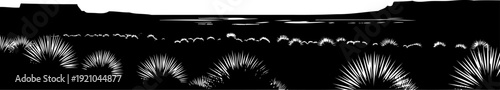 Desert panorama silhouette with yucca plants and distant mountain mesas