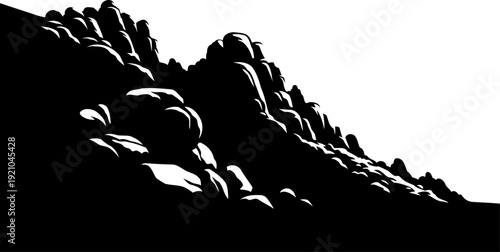 Jagged mountain peak silhouette with steep rocky crags and boulders