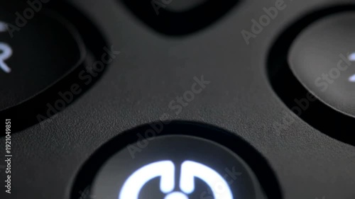 Power Button Closeup on Electronic Device.