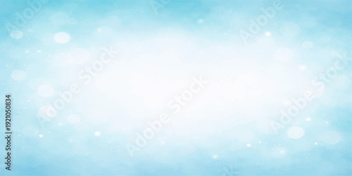 A bright abstract blue bokeh background features a soft winter cloudscape design with a blur of holiday lights and snow patterns creating a heavenly nature wallpaper illustration