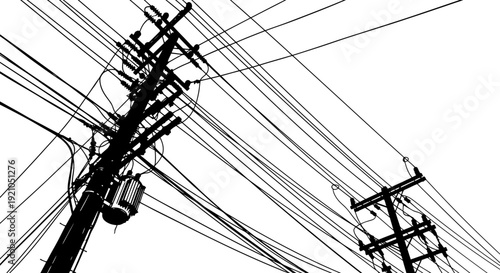 silhouetted power lines and utility poles creating a tangled urban electricity infrastructure perfect for tech and energy concepts.