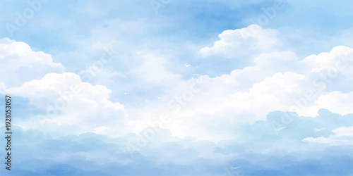 Beautiful bright blue summer sky filled with fluffy white cumulus clouds on a sunny day of clear air and natural sunlight