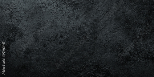 A heavily textured dark gray and black abstract wall background with a distressed and mottled appearance