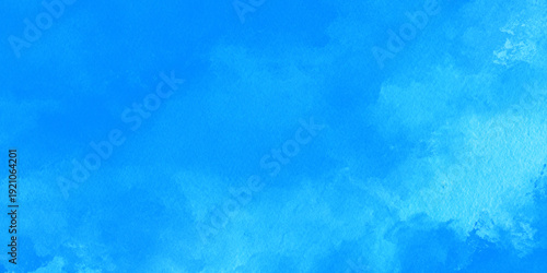 Abstract blue watercolor sky background with soft white clouds turquoise textures. The composition mimics a soft, cloudy sky with artistic paint.