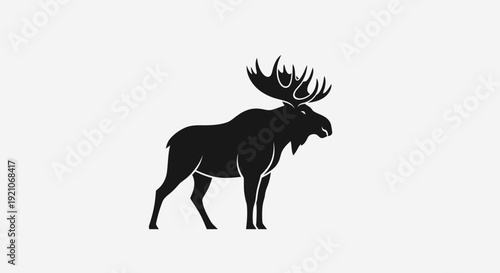 A striking black silhouette of a majestic moose with large antlers stands against a plain white background.
