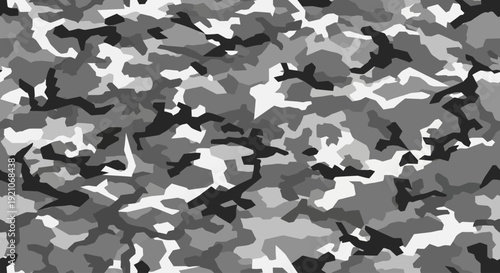 A black and white camouflage pattern with irregular shapes and varying shades of gray.