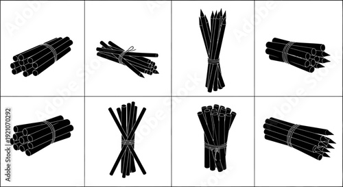 Bundles of black chopsticks on white background various arrangements tied with string for asian cuisine and dining