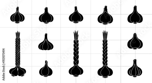 Various black garlic bulbs and cloves isolated on white background for food and cooking concepts