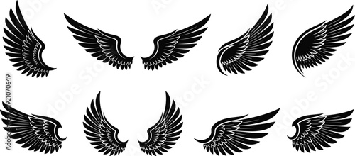 Collection of black bird and angel wing silhouettes, gothic feather wing set, tribal eagle wings vector illustration, heraldic freedom symbols