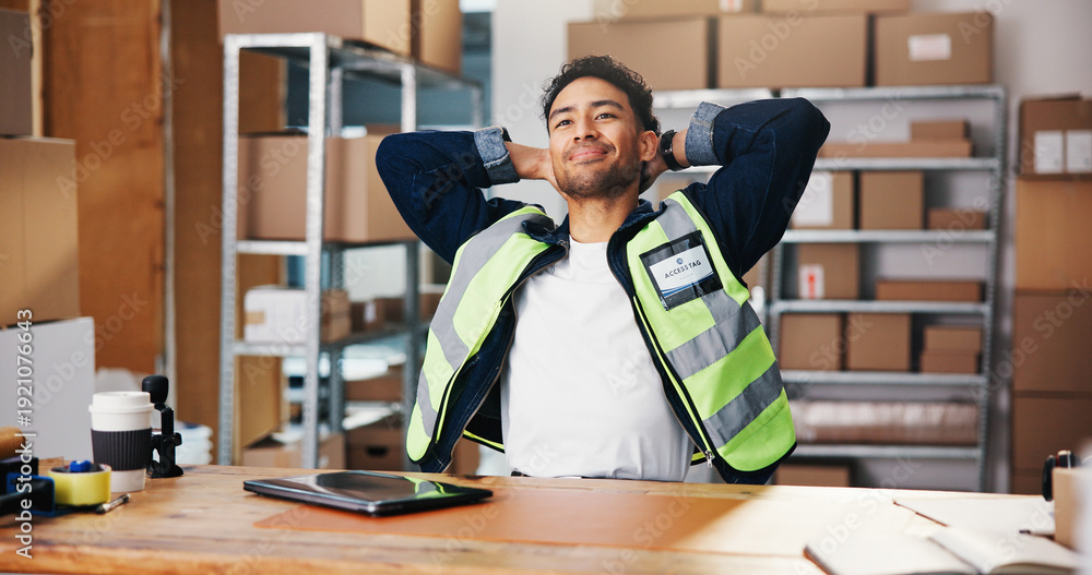 © WesJVR/peopleimages.com - Happy man, relax and stretching with small business in logistics for completion or done tasks. Male person, productive or finished with smile, boxes or cargo for supply chain or delivery deadline