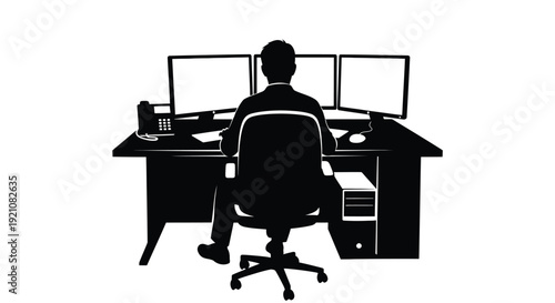 Silhouette of a person working at a desk with multiple computer monitors