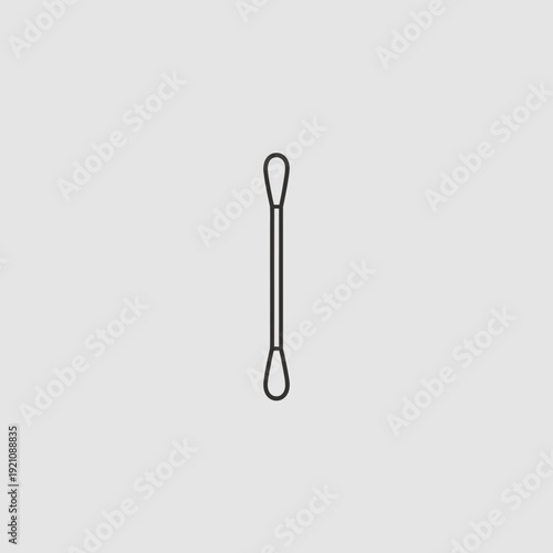 A simple black dental floss pick on a white background is displayed.