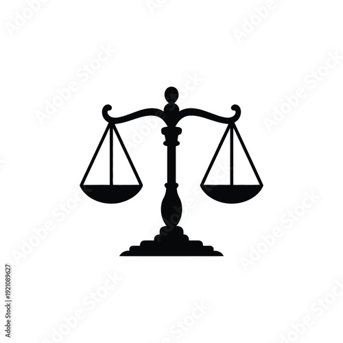 A simple black and white illustration of a traditional balance scale.