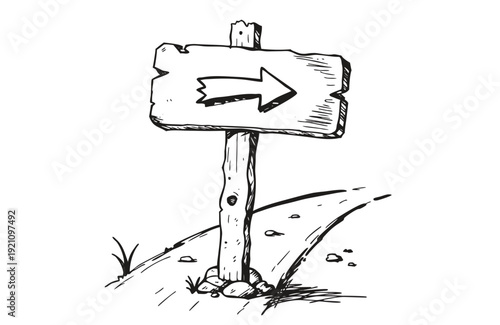 Wooden sign on post with right pointing arrow on dirt hill