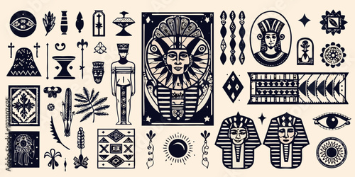 An arrangement of vintage egyptian themed tarot cards and decorative ornaments