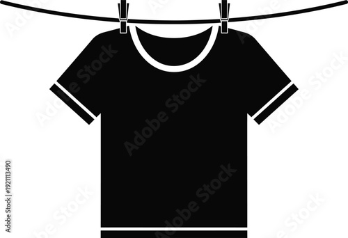Black t shirt hanging on a clothesline