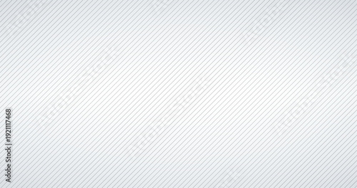 A close-up view of a white surface with thin gray lines