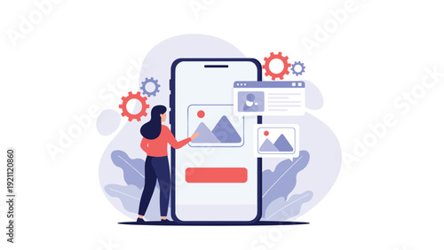 Creative designer or developer optimizes mobile application interface with icons and graphics on a large smartphone screen.