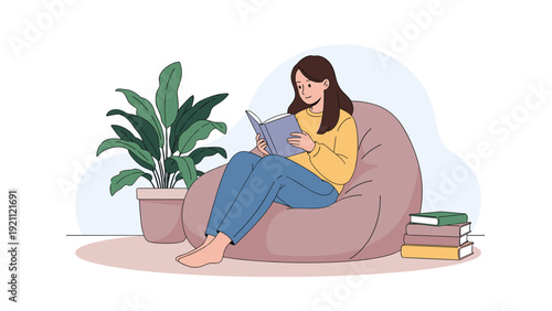 Young woman sitting in a comfortable beanbag chair focused on reading a book in her cozy home living room surrounded by plants.