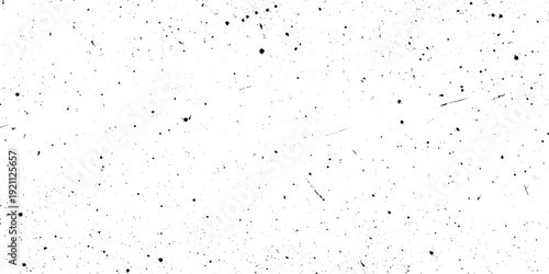 White speckled texture with scattered black dots abstract grunge background black distressed elements, grit, and grainy speckles.