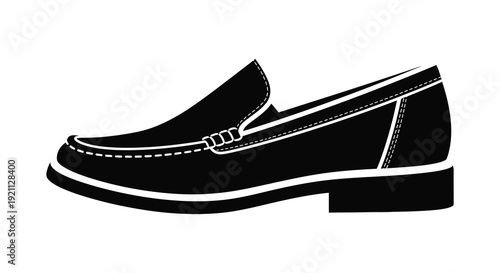 A striking black and white image showcases a single loafer shoe emphasizing its classic design as a silhouette high quality