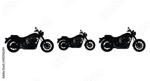 Three vintage motorcycles displayed in a dark striking silhouette
