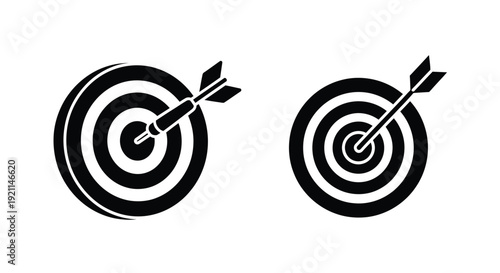 Two target boards with arrows a striking black silhouette