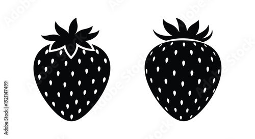 Two black strawberry shapes against a white background silhouette