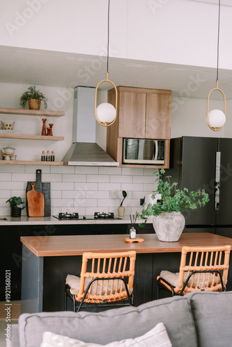 Stylish Modern Kitchen Interior with Island and Dining Area