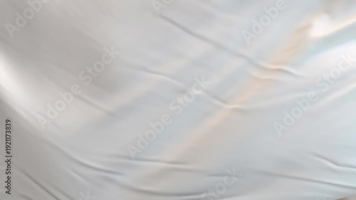 Elegant White Silk Fabric Flowing Texture Background