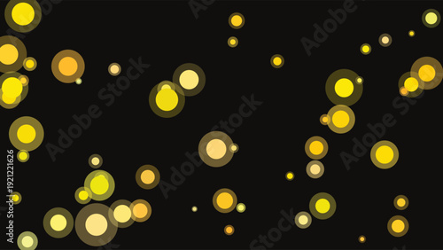 Abstract digital bokeh lights composition with vibrant yellow and soft gradient glows on deep black background for modern graphic design and creative projects