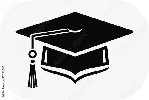 Graduation cap and book icon