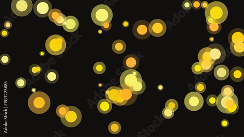 Abstract digital bokeh light spots composition with soft glowing yellow and orange hues on deep black background for modern graphic design